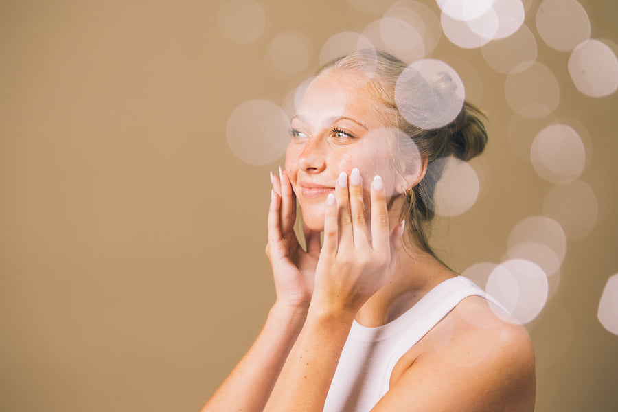 Girl washing  face with the Generation Bee soap