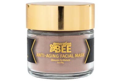 Glass jar of anti-aging facial mask with gold lid and 'Generation BEE' branding