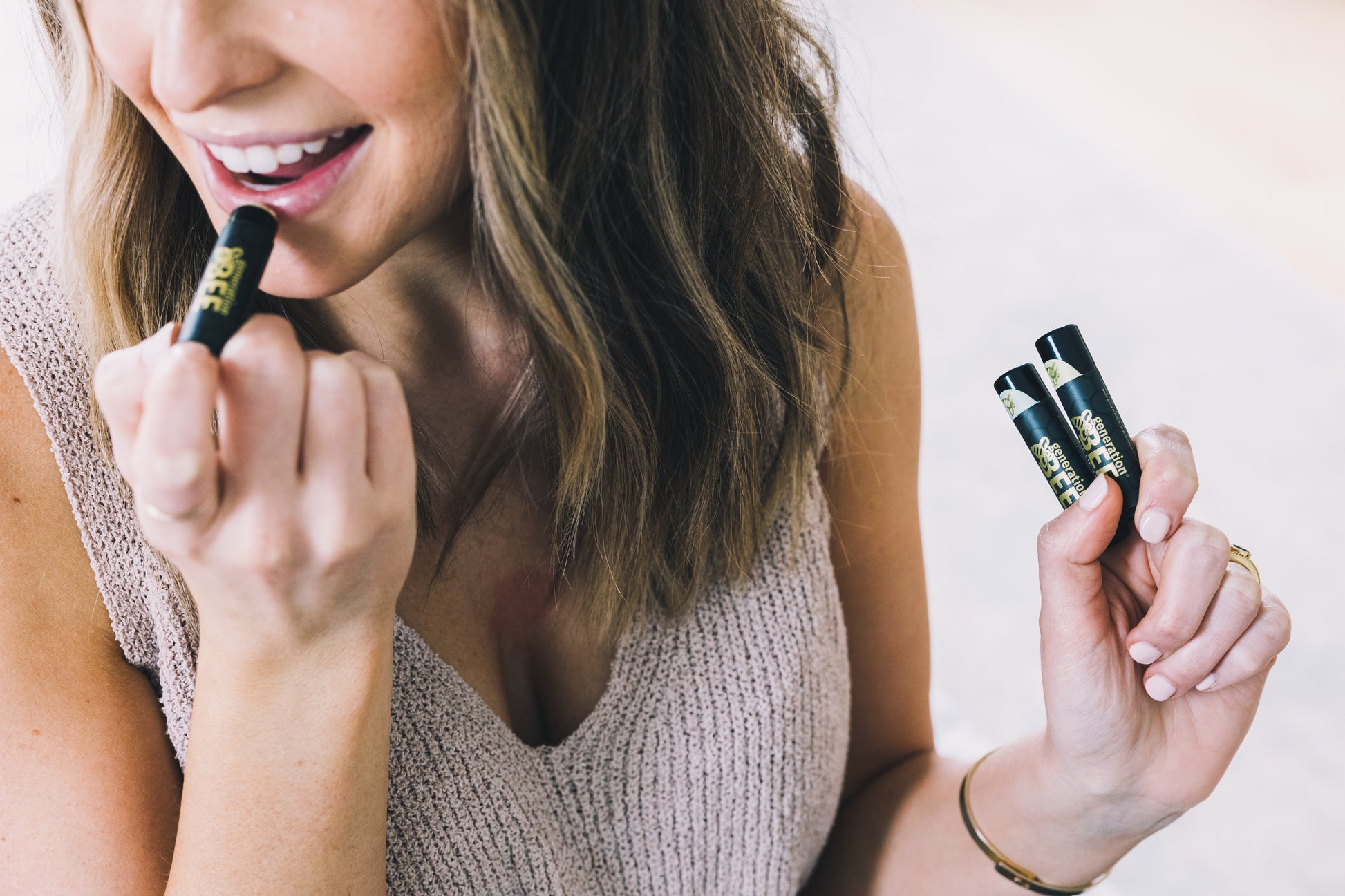 Generation Bee lip stick applying 